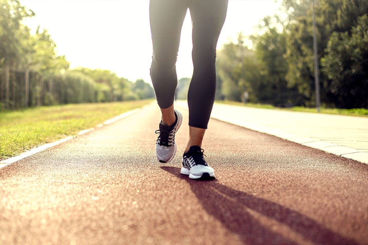 Foot and ankle treatment in progress showing hands-on regenerative therapy technique