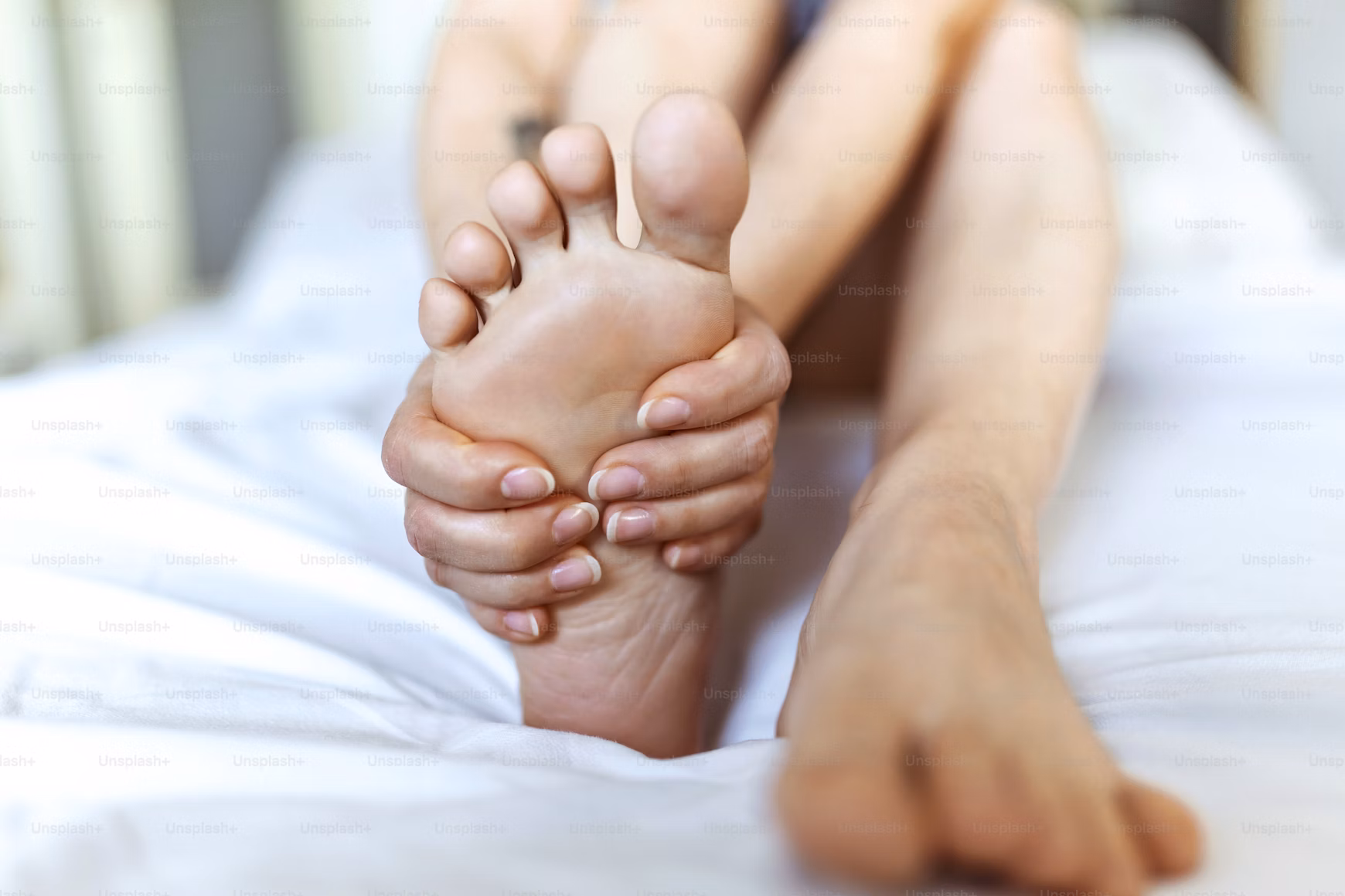 Patient receiving treatment for burning feet condition at Marin County wellness clinic