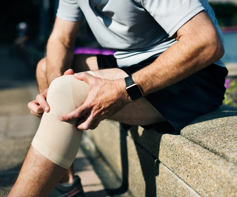 Person performing low-impact exercises for knee osteoarthritis