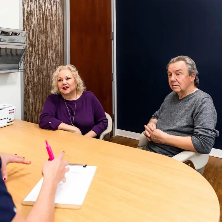 Marin Joint Health clinician reviewing the 12-week knee pain protocol with two patients