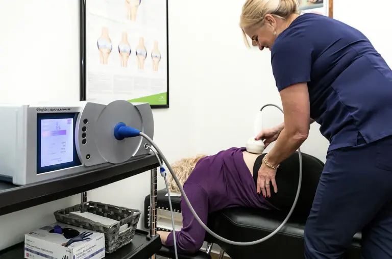 Clinician applying focused shockwave therapy to a patient at Marin Joint Health